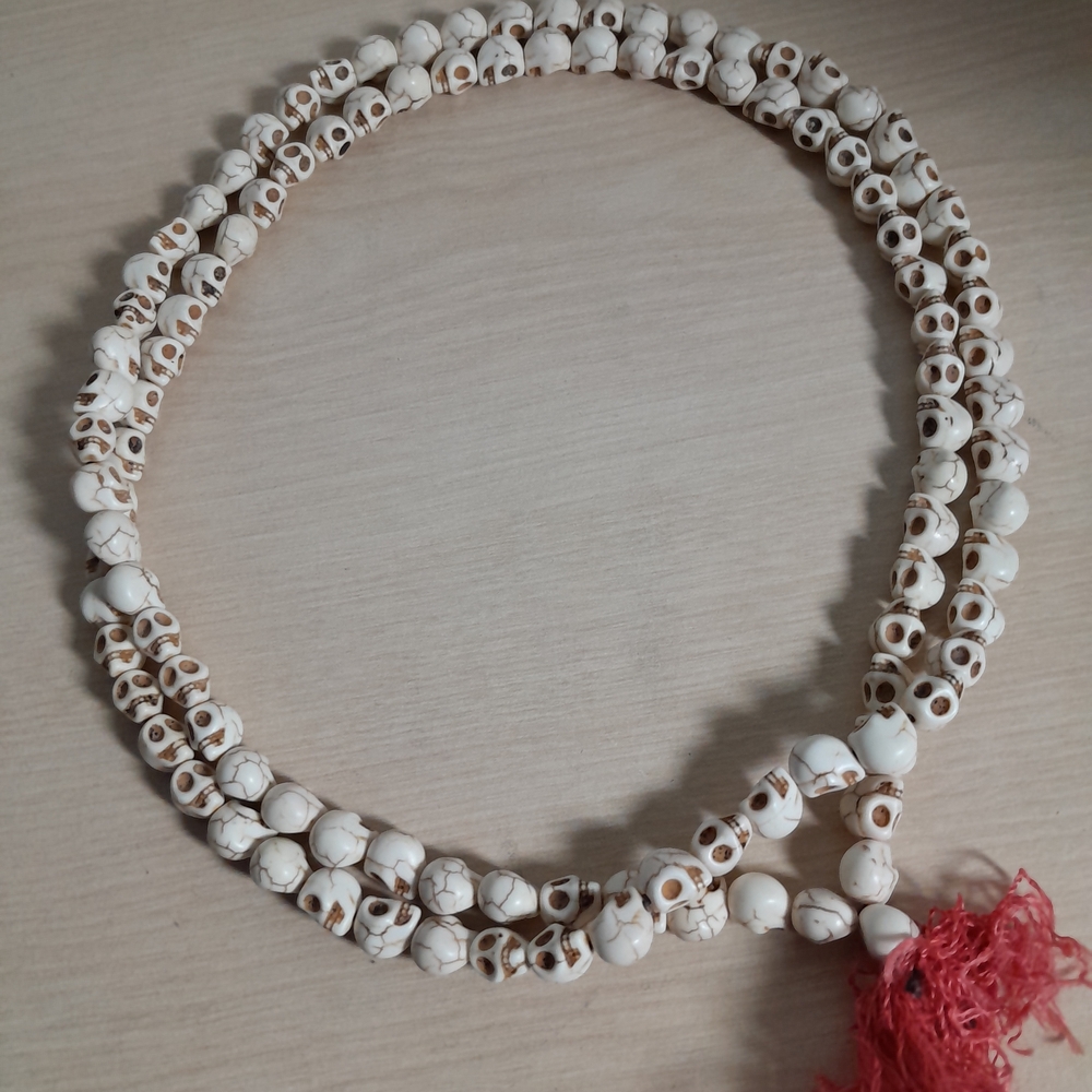 White Beaded Necklace with Red Tassel